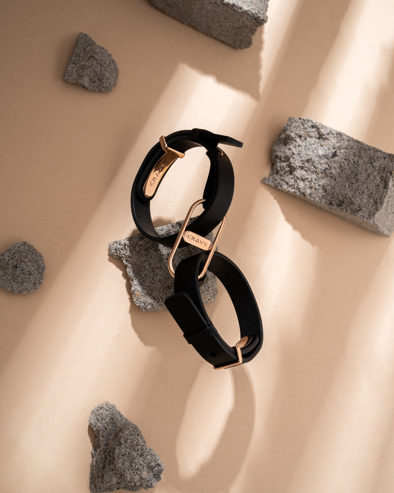 CRAVE ICON CUFFS (BLACK LEATHER & ROSE GOLD)